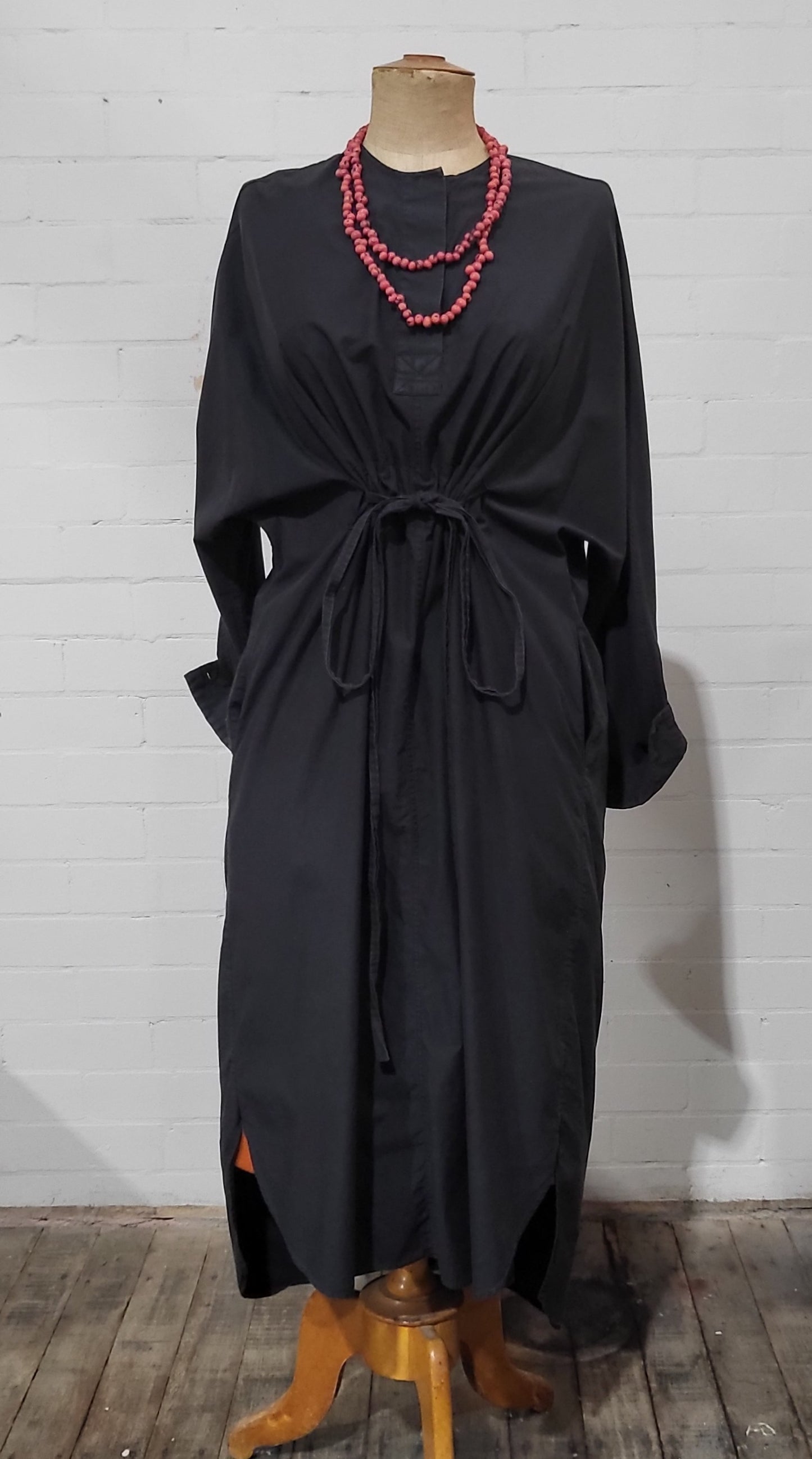 Back view of black Lee Mathews oversized dress