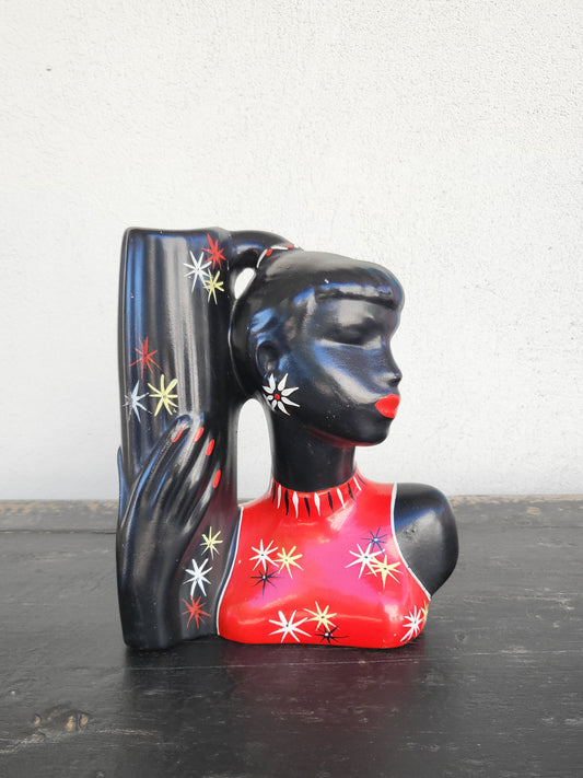 Front view of Barsony HL 6/B lamp base, female bust with ponytail and red atomic starburst dress.