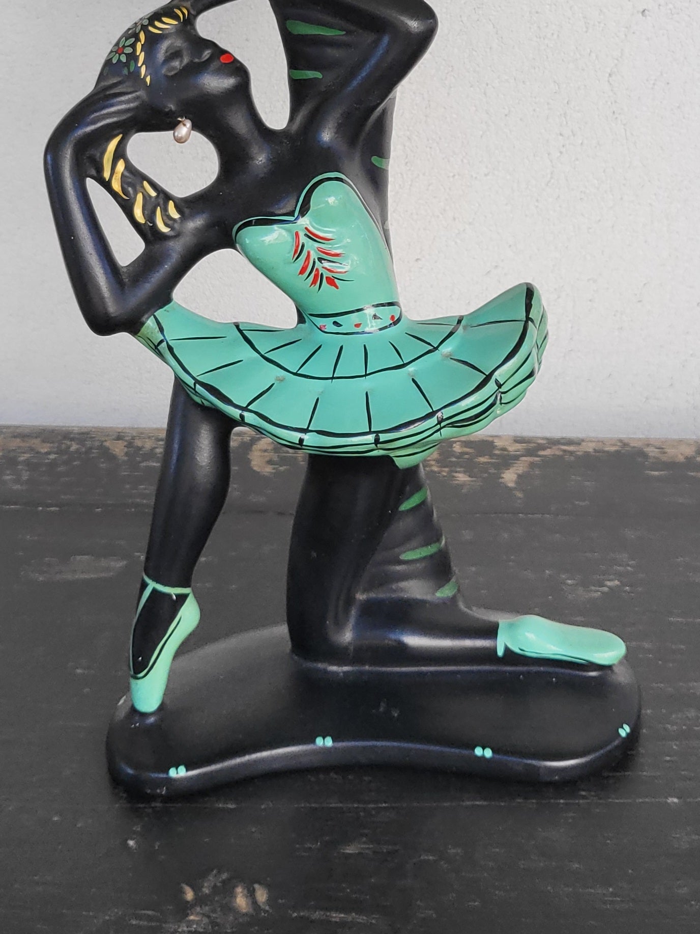 Detail of Barsony ballerina lamp, hand-painted features and green costume.