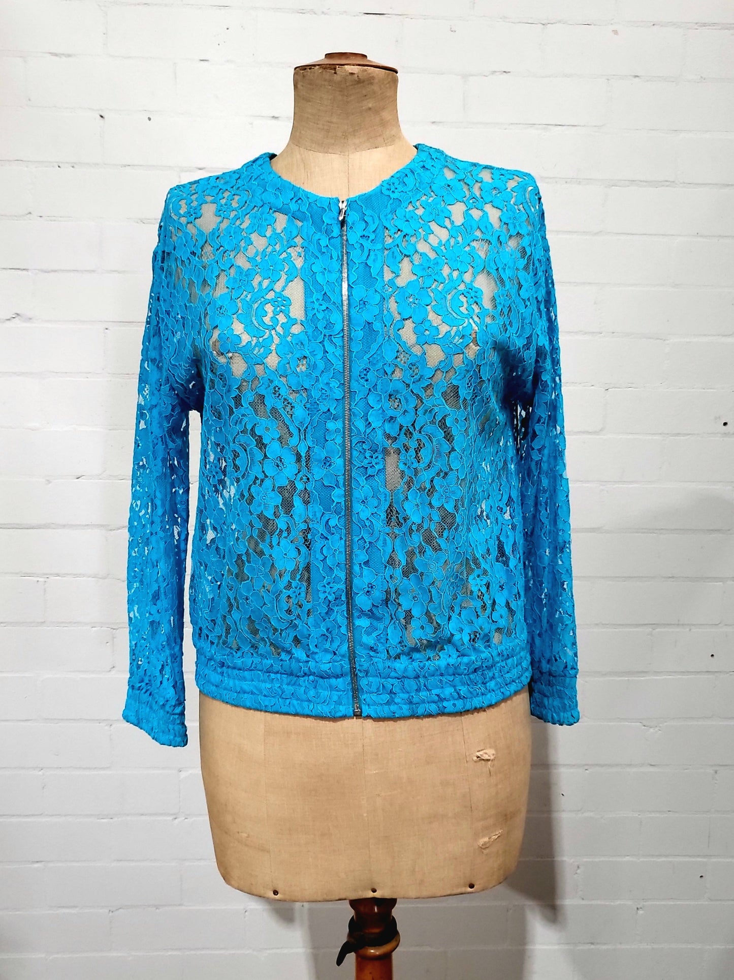 Front view of Zimmermann blue lace Flip Side Lace Bomber zipped cardigan