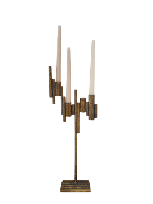 Mid-century brutalist iron candelabra with gold patina and staggered tubular holders.