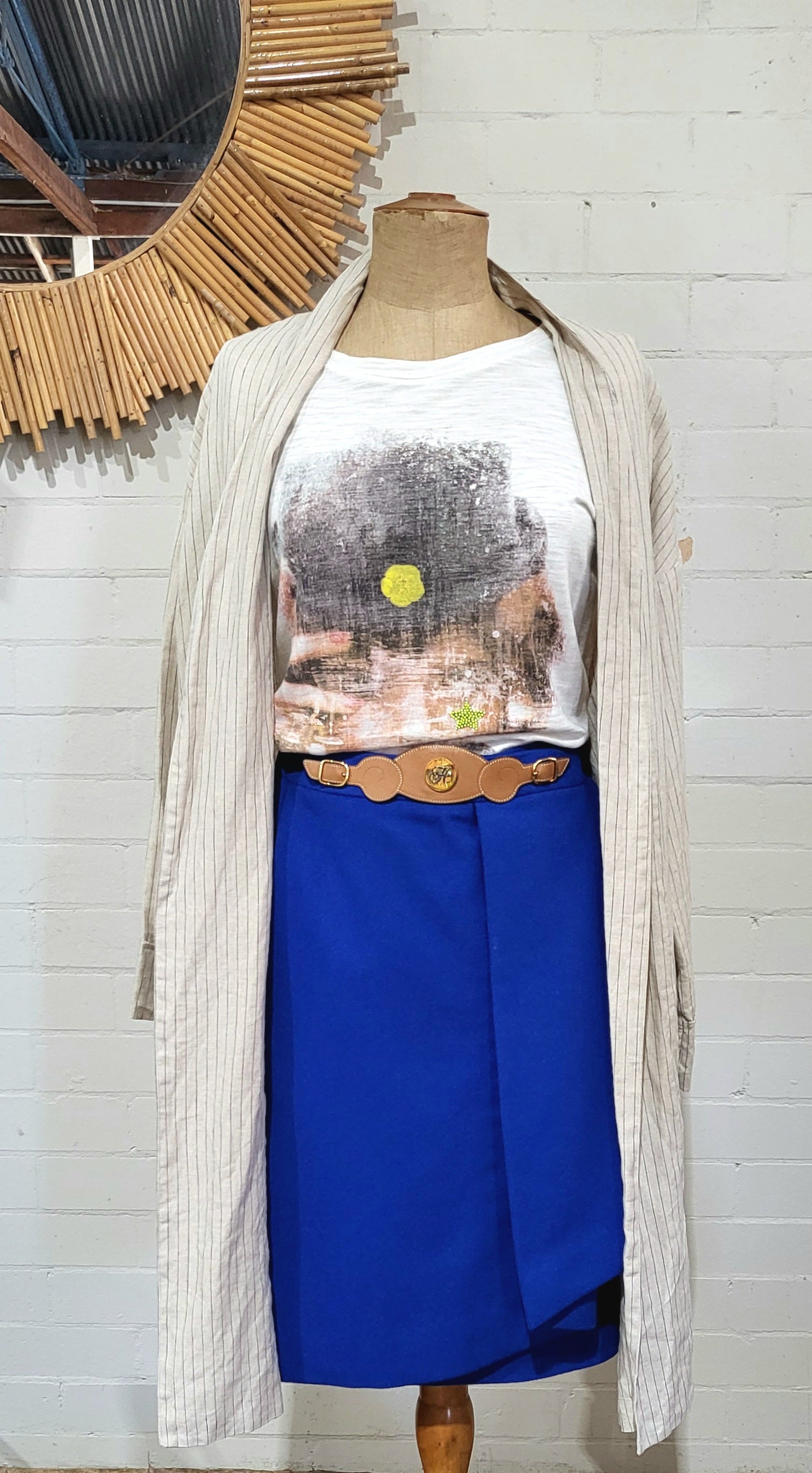 Hermès 1980s cobalt blue wool wrap skirt with camel leather waistband and gold H button