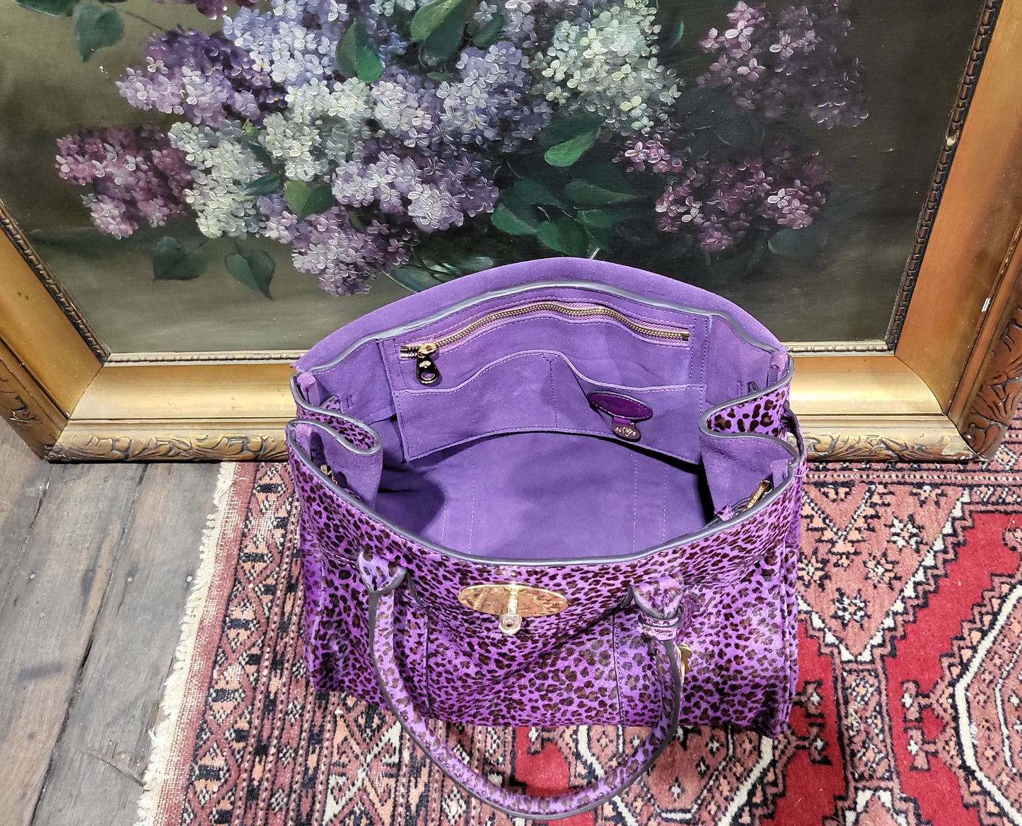 Interior view of Mulberry Bayswater bag with suede lining and slip pocket.