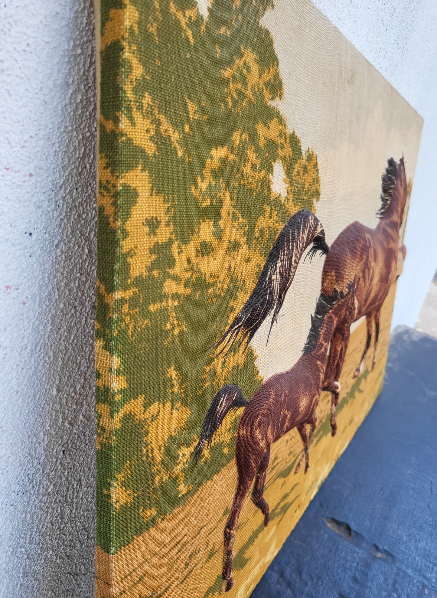 Side view of vintage horse textile art showing padded pop-out effect on stretched fabric, 68cm x 45cm.