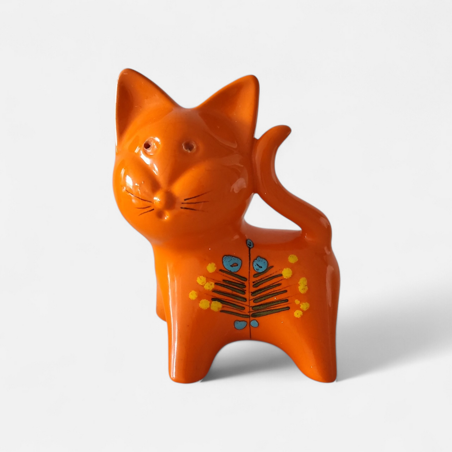 1950s orange ceramic cat money box with hand painted folk floral motif, mid century European studio pottery piggy bank