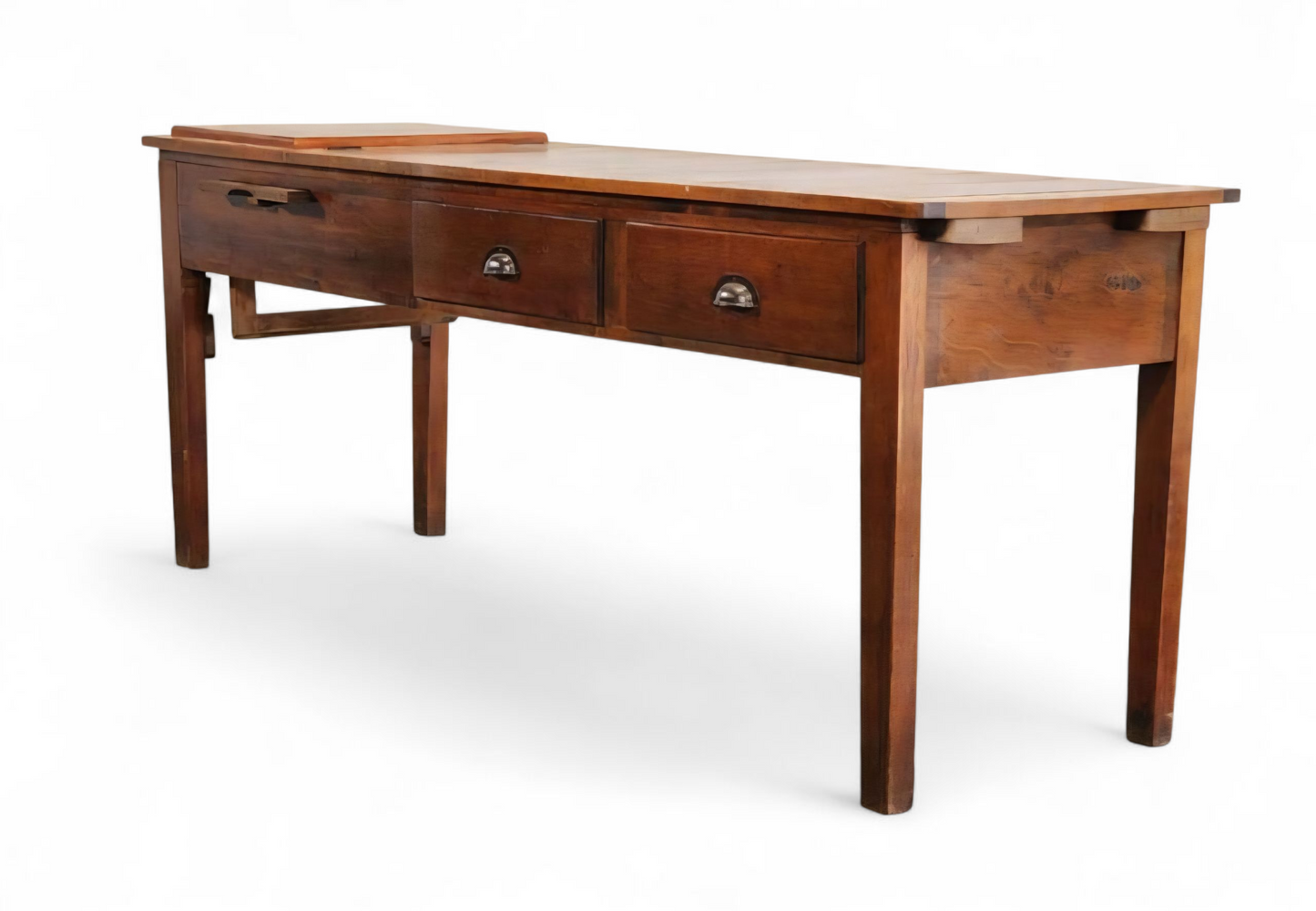 1920s hardwood doctor’s examination table from a Hunter Valley medical clinic, featuring two drawers with brass cup pulls and a lift-top compartment. The solid timber construction and aged patina highlight its craftsmanship and history